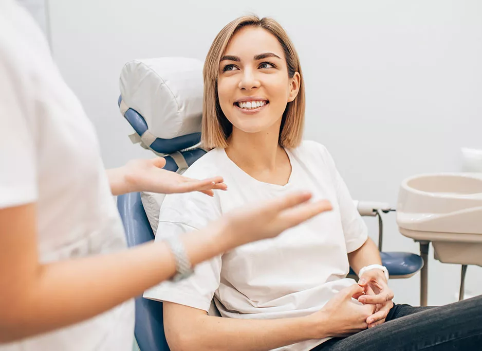 Dentist explaining procedure to patient